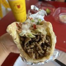 The Halal Guys signature dishes Lamb & Beef Gyro Sandwich
Hummus
Baklava